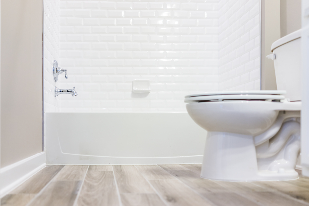 Why Is Water Coming Back Up Through Your Shower Drain When You Flush the Toilet?